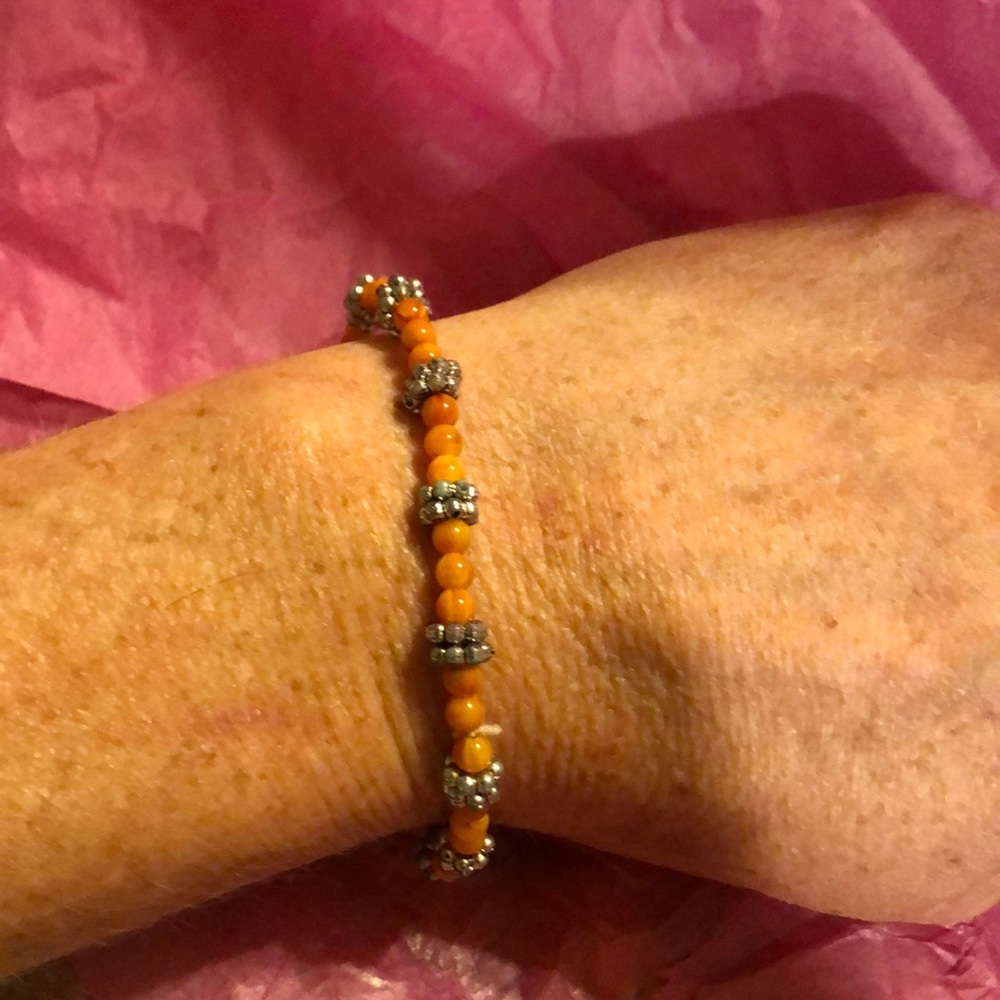 Orange and silver beaded bracelet